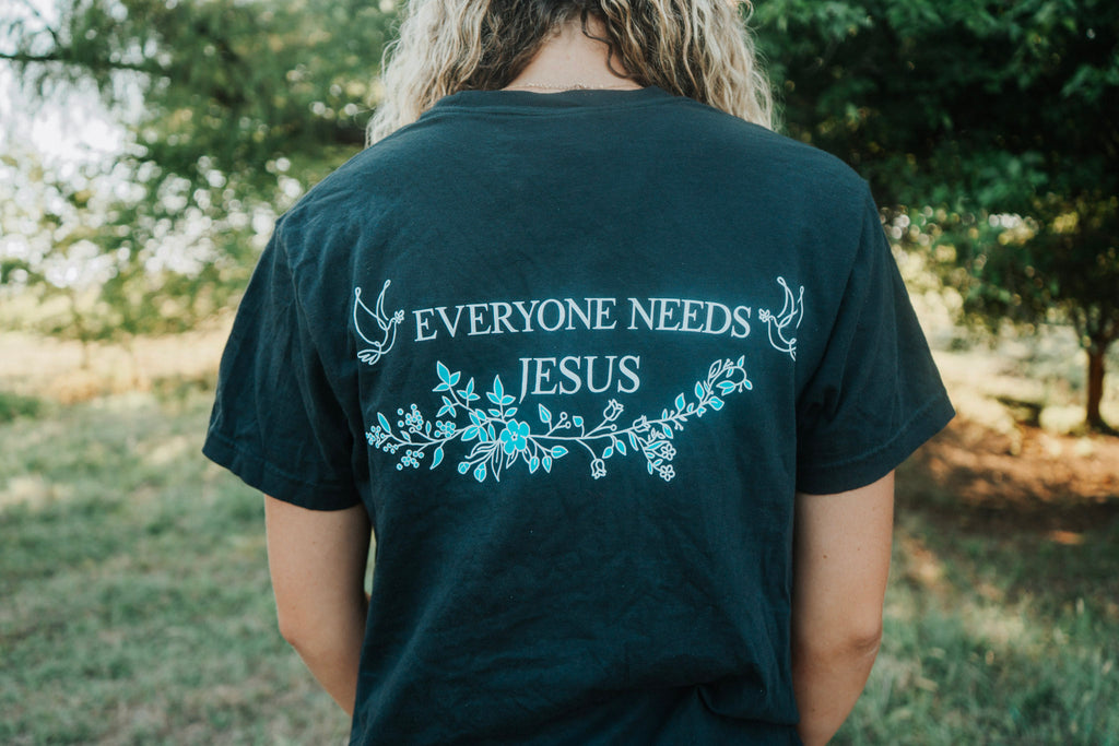 Flowered Light Blue Everyone Needs Jesus T-Shirt
